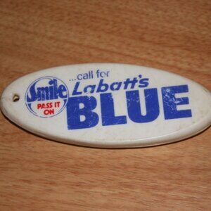 Vintage Labatt's Blue Bottle Opener Floating